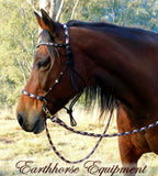 Sliding chin riding halter and reins set in black with "Prairie Dusk" padding/inset/reins and turks head cheek accents