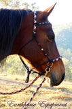 Sliding chin riding halter and reins set in black with "Prairie Dusk" padding/inset/reins and turks head cheek accents