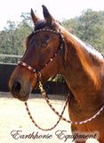 Sliding chin riding halter and reins set in black with "Prairie Dusk" padding/inset/reins and turks head cheek accents